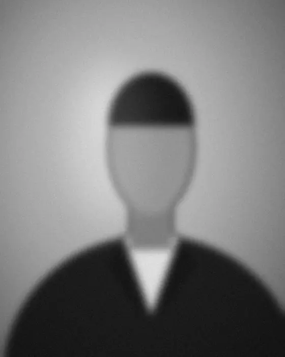 Portrait of team member 3 (placeholder image)